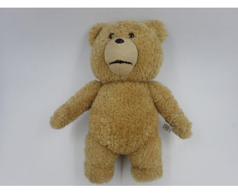 Ted from the movie Ted. Battery opereted, batteries required. Approx. 40cm (H). UK P&amp;P Group 3 (£30+VAT for the first lot