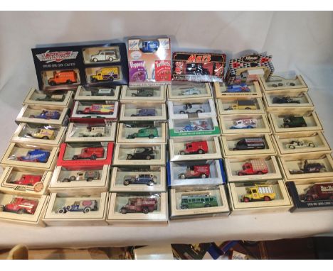 Approximately seventy diecast vehicles, mostly Lledo, including promos, mostly excellent condition, boxes with wear. UK P&amp