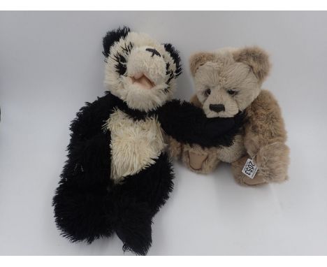 Two Charlie Bears, no tags, one is a panda hand puppet and one is stitch down nose and jointed at limbs. Approx. 45cm (H). UK