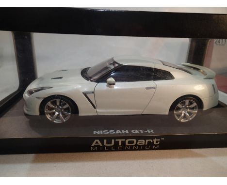 Auto Art Millennium 1/18 scale Nissan GT-R, near mint condition, boxed. UK P&amp;P Group 1 (£16+VAT for the first lot and £2+