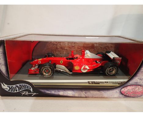 Hot Wheels 1/18 scale Ferrari F1 car, Sakhir/Bahrain 04/04/2004, factory sealed. UK P&amp;P Group 1 (£16+VAT for the first lo