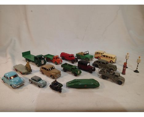 Thirteen Dinky Toys cars and commercials, including early issues, mostly good condition, plus refurbished spot-on Morris Mino