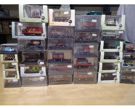 Thirty three OO scale Oxford diecast vehicles including Circus related, fire, ambulance, fork lift truck, police etc, mostly 