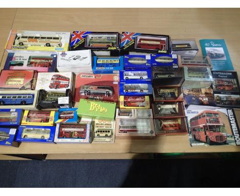 Thirty assorted buses and coaches, various makes and scales, mostly excellent condition, wear to boxes, plus bus related book