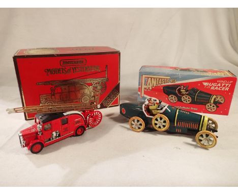 Matchbox YS9 Leyland cub fire engine, plus tinplate/clockwork Bugatti racer, both excellent condition, wear to boxes. UK P&am