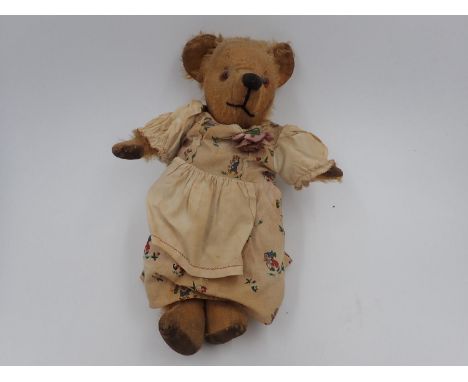 Rose Pedigree Bear with rose pin on Snow white disney dress. No tags. Signs of age related wear, stitch down nose and jointed