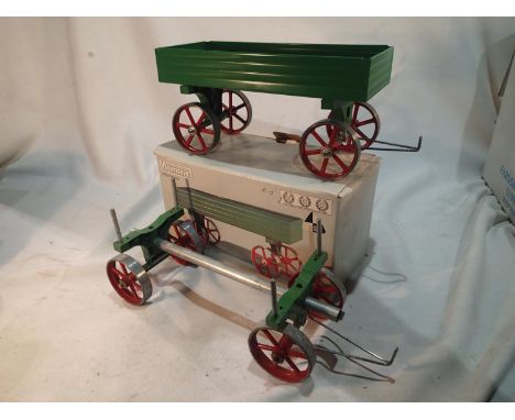 Two Mamod trailers, open wagon, damage to rear axle casting, otherwise excellent condition, boxed, plus log wagon in very goo