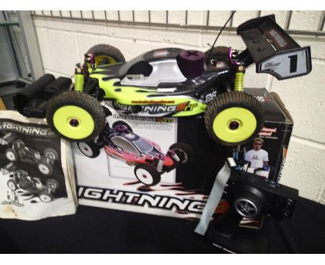 Hot Bodies Lightening 2 racing buggy glow engine, with transmitter and starter, good condition, untested, approximately 60 cm