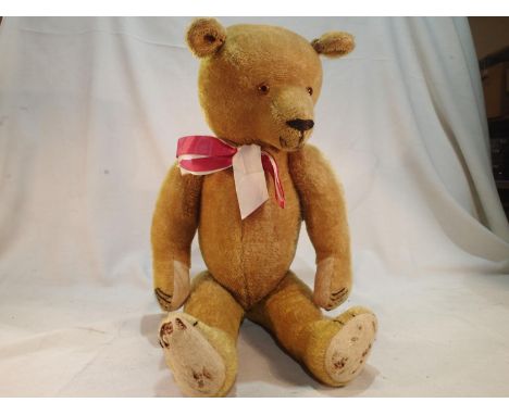 Vintage straw filled teddy bear, H: 60 cm, joined head, legs and arms, growler not working, loose inside body. UK P&amp;P Gro