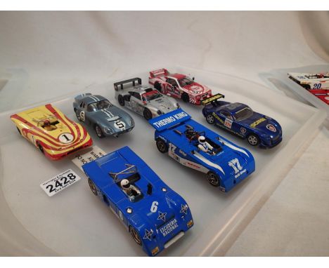 Seven assorted 1/32 scale slot cars, various makes and types, all unboxed, mostly very good to excellent condition. UK P&amp;