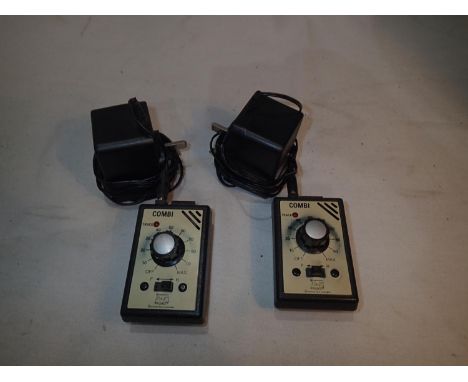 Two Gaugemaster Combi single track controllers with wall plug adapters. UK P&amp;P Group 1 (£16+VAT for the first lot and £2+