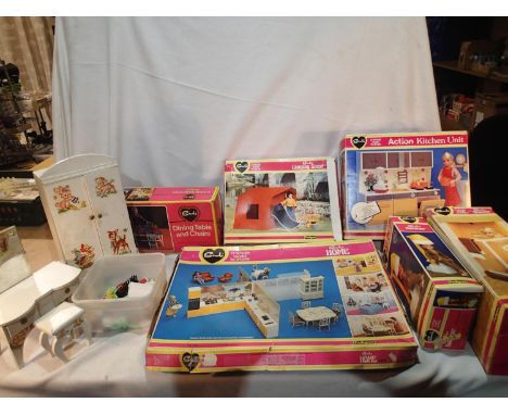 Selection of vintage Sindy items, including home, dining table and chairs, camping scene, kitchen unit, hairdryer, shower, al