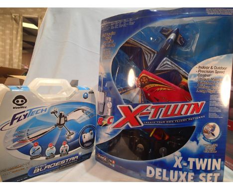 Radio control twin aircraft set suitable for indoor or outdoor use, plus Fly Tech Blade Star, both appear as new and unused. 