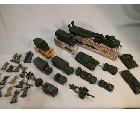 Twelve Dinky Toys military related vehicles, three boxed, plus Lone Star and Benbros, also includes selection of plastic sold