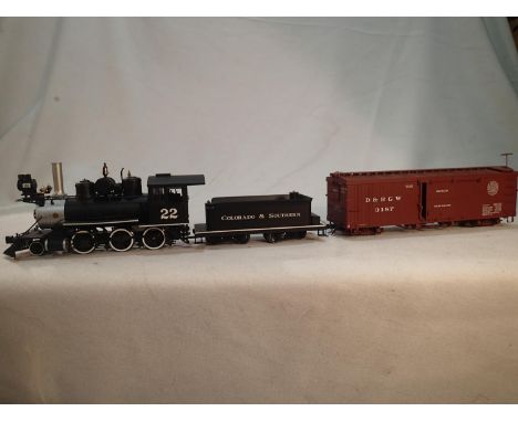 On 30 scale Bachmann 2.6.0 and tender, black, 22, Colorado and Southern, very good condition, wrong box, plus D&amp;RGW box c