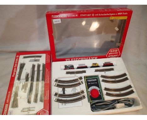 N gauge Fleischmann Piccolo 9315 train set, 0.4.0 tank loco and three wagons, track and controller, also includes track pack 