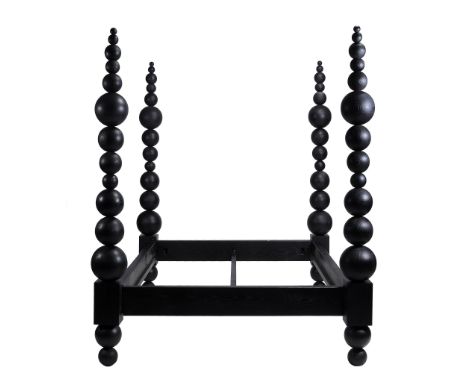 A black painted four poster bed , of recent manufacture  A black painted four poster bed  , of recent manufacture, the posts 
