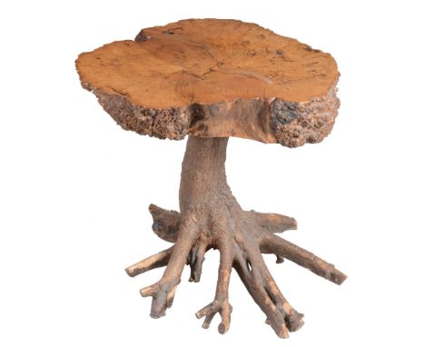 A tree table, late 20th century, with trunk cross-section top and a root...  A tree table,   late 20th century, with trunk cr