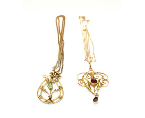 A peridot and seed pearl pendant on chain, chain length 42.5cm and a ruby and seed pearl pendant on a 9 carat gold chain, cha
