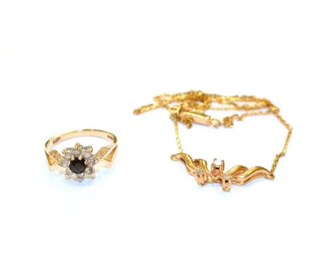 A 9 carat gold diamond necklace, length 40cm and a 9 carat gold sapphire and diamond cluster ring, finger size L1/2.  Gross w