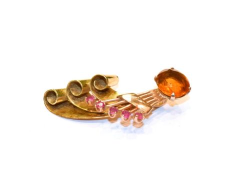 A citrine and ruby pendant, measures 4.6cm by 2.3cm .  Unmarked. Gross weight 7.9 grams. 