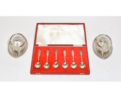 A pair of Edward VII silver-mounted cut-glass salt-cellars and stands, by Blackburn and Tysall, London, 1901, each navette sh