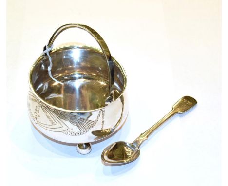 A Russian silver bowl and an associated Russian silver spoon, the bowl tapering and on three ball feet, engraved with foliage