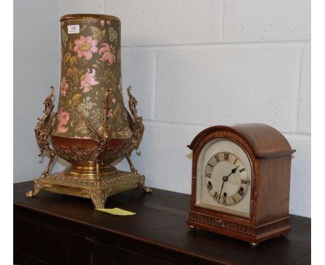 A Victorian pottery vase converted to a lamp with gilt metal mounts and a 1920's chiming mahogany mantle clock (2)