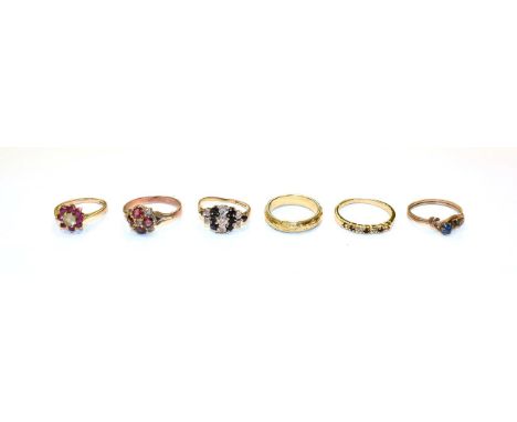 A garnet and opal cluster ring, unmarked, finger size Q, a 9 carat gold gem set ring, finger size L, a 9 carat gold sapphire 