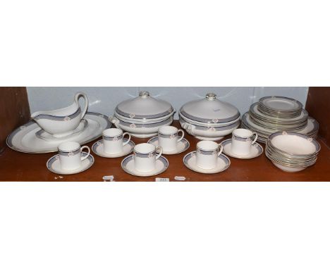 A Wedgwood Waverly pattern dinner/coffee service, comprising two tureens and covers, meat plate, gravy boat and stand, six di