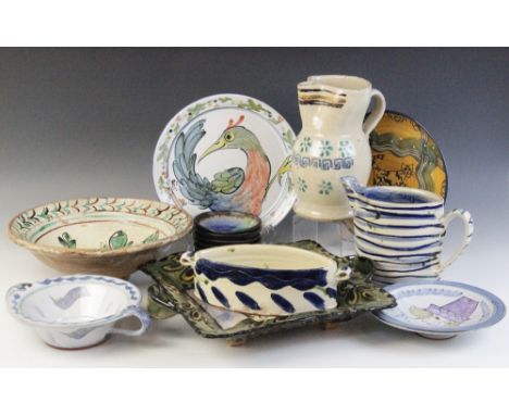 A collection of art pottery, to include; an unusual two handled square platter, depicting a portrait of a man in a hat to cen