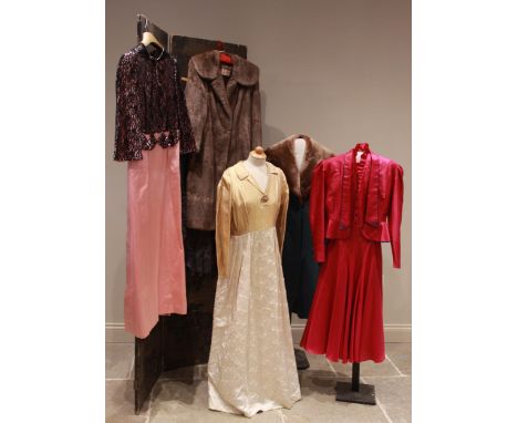 A collection of 20th century lady's clothing and accessories to include; two fur collared wool coats, one retailed by 'Koupyc