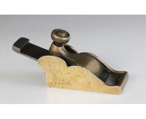 A Spiers number 10 gunmetal chariot plane, circa 1840, the brass body with knurled adjustment screw holding a 1" wide steel b