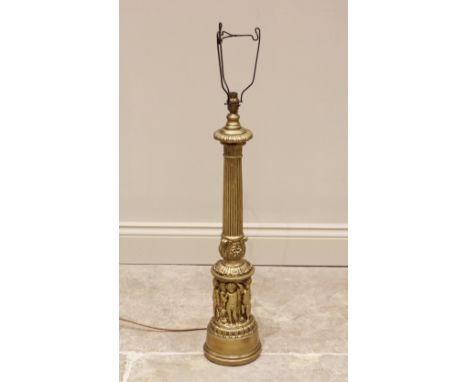 A gilt composite column table lamp, 20th century, the reeded and tapering column extending to a foliate cast cup and collar, 