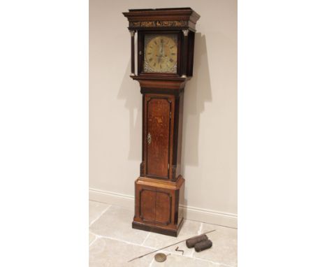 A George III oak cased eight day longcase clock, signed S Ashton, Bradbury, the flat top hood above a gilt highlighted frieze