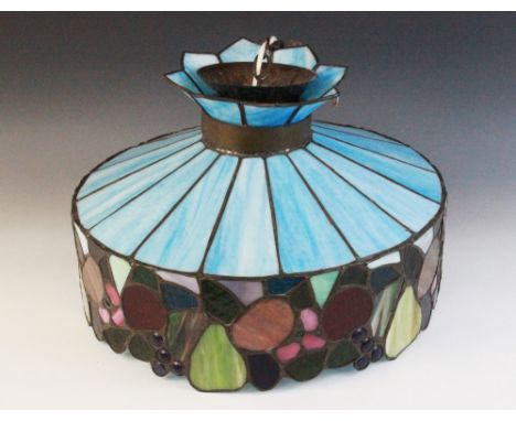 A Tiffany style circular light shade, late 20th century, segmentally constructed from blue opaline glass panels above a colou