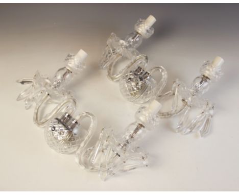 A pair of French glass two branch wall light fittings, early 20th century, each formed as two 'S' shaped branches terminating