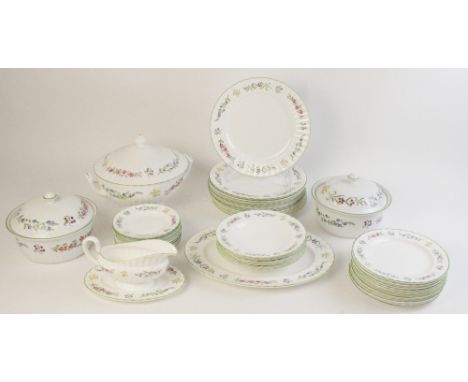 A Royal Worcester "Fleuri" pattern part dinner service, comprising: a two handled tureen and cover, 29cm wide, and oval servi
