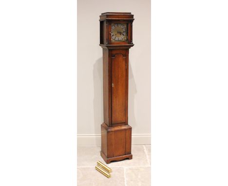 An early 20th century oak cased grandmother clock, the caddy top with freestanding ring turned pillars flanking the 18cm gilt