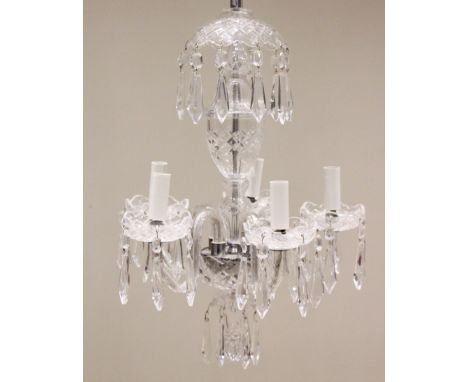 A Waterford crystal chandelier, late 20th century, the five 'S' shaped branches extending to dish shaped sconces with bead an