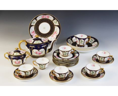 A Royal Crown Derby part tea service, late 19th century, comprising: a teapot and cover, a sucrier and cover, a milk jug, six