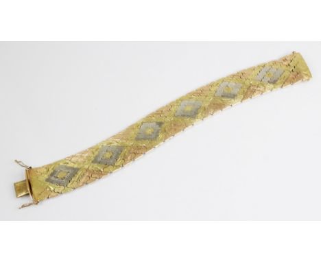 A vintage Italian 18ct gold bracelet, the articulated links in yellow, rose and white gold with silk and matte finish and eng