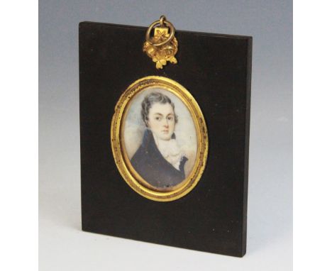 English school (early 19th century),A bust length oval portrait miniature depicting a young gentleman in Regency dress,Waterc