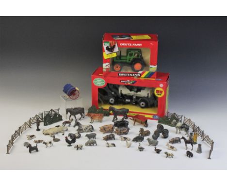 A collection of vintage die-cast farm animals and equipment by Britains and others, to include horses, cows, pigs, turkeys, h