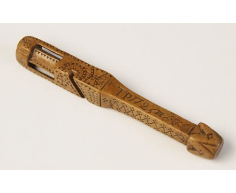 A treen knitting sheath, 18th century, possibly sycamore, with chip carved decoration in an all-over geometric pattern, cage 