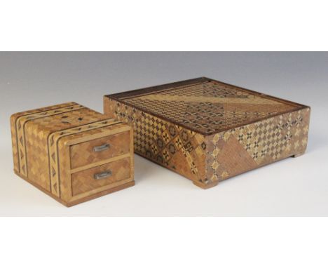 An early 20th century stationary box, of rectangular form with marquetry inlay and tambour cover, cedar wood lined interior, 