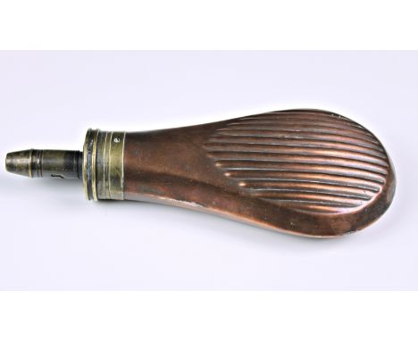 A 19th century Frith Patent powder flask, of typical form, having part ribbed belly, 7¾in. (19.8cm.) long.