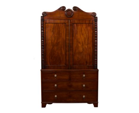 A good late-Regency mahogany linen press, stamped by A. Solomon &amp; Co., 59 Queen St., London to one drawer, the shaped scr
