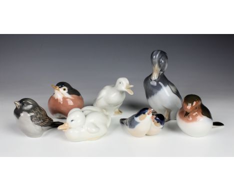 Five Royal Copenhagen bird figurines, comprising of 1941 Duck; 516 Duck group; 1189 Two birds; 1519 Sparrow; 2266 Robin, toge