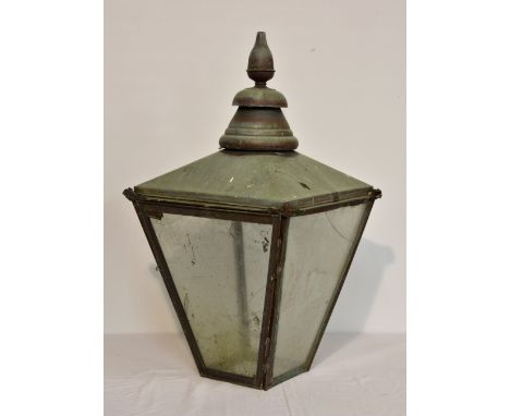 A large outdoor copper lantern with teardrop finial, of typical form, nice green patina, 18in. (45.8cm.) square at widest, 32